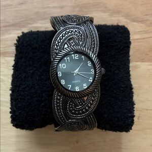 Intricate Black Quartz Women's Watch
